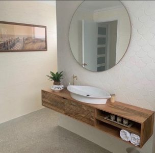 Former TV Unit now a bathroom vanity. Design by Bathrooms By Grace